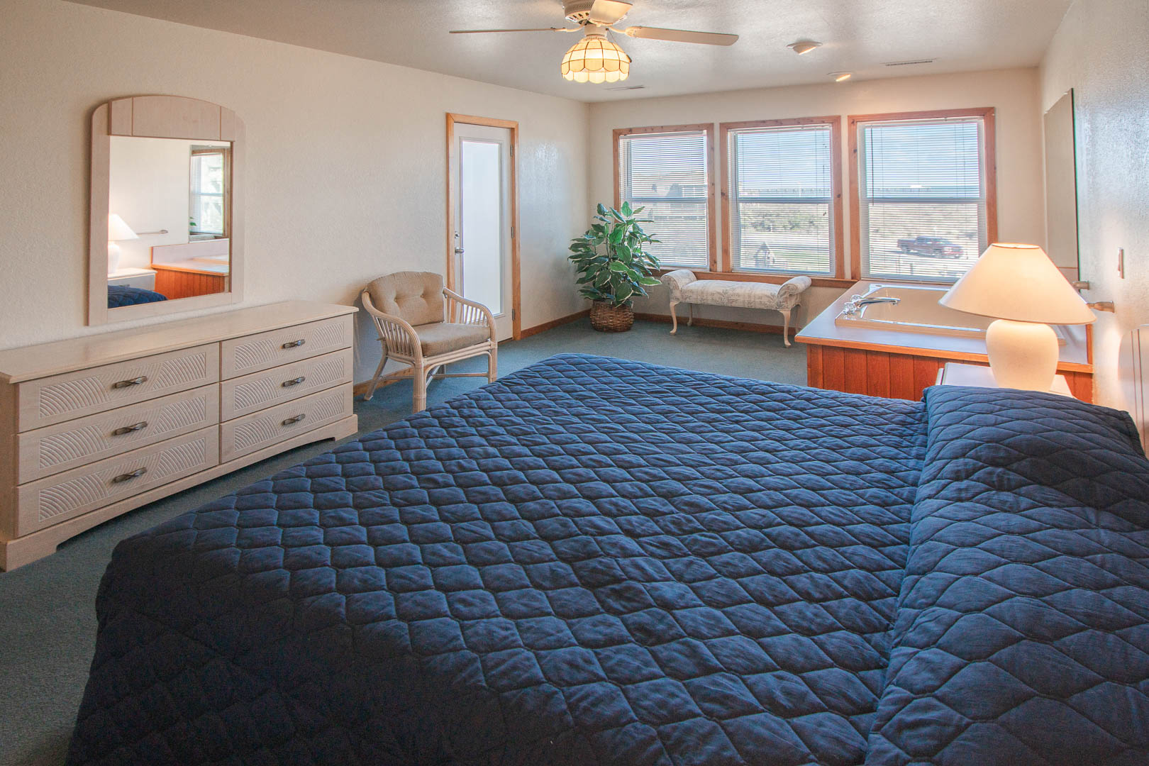 A spacious master bedroom at VRI's Barrier Island Station in North Carolina.